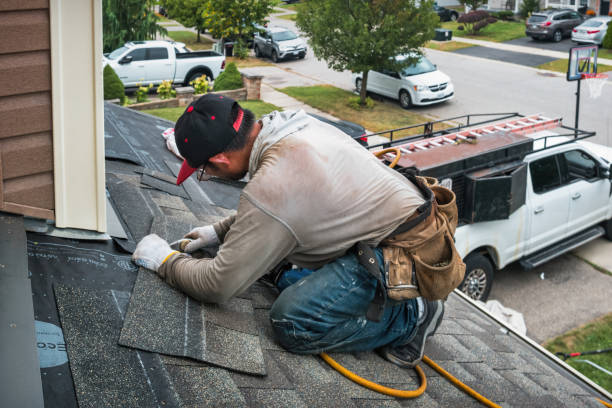 Professional Emergency Roof Repair technician working in Hebron, IL